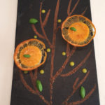 オレンジとバジルのあしらわれたフォアグラ。まるでデザートのような味わい。シャンパンとよく合う。